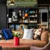Original Sokos Hotel Arina in Oulu lounge with colorful sofa, cushions and coffee bar behind