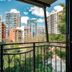 Il Mondo Boutique Hotel in Brisbane balcony view of city high-rises and greenery
