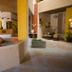 Studio Suite at Marina Cabo Plaza in Cabo San Lucas, open lobby with lounge seating and tiled floors