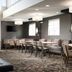 Residence Inn by Marriott Texarkana lobby seating area with tables, chairs, sofas and wall-mounted TV
