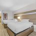 MainStay Suites Knoxville - Cedar Bluff in Farragut: guest room with two beds, desk and kitchenette