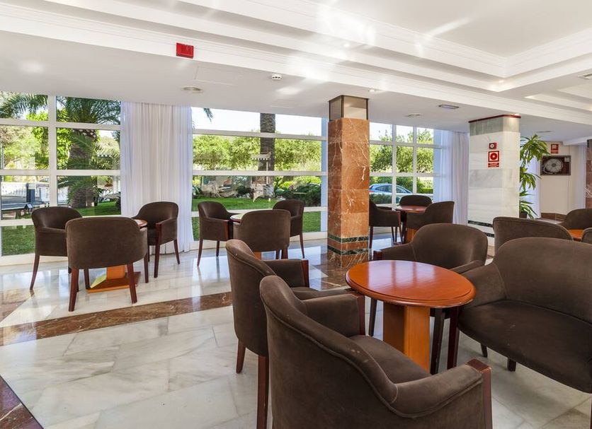 Globales Palmanova Palace lobby lounge in Palma Nova with seating and large windows