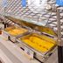 Holiday Inn Express Boca Raton-West breakfast buffet with hot trays and pastries in Boca Raton