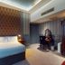The Coal Exchange Hotel Cardiff room with double bed, vanity desk and armoire
