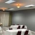 Wyndham Garden Lake Guntersville meeting room with tables, chairs, and projection screen