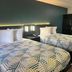 Studio 6 Huntsville, AL University Drive room with two double beds and kitchenette