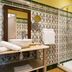 Hôtel & Spa du Domaine des Thômeaux, Mosnes bathroom with vessel sink, patterned tile, and walk-in shower