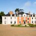 Hôtel & Spa du Domaine des Thômeaux, Mosnes: historic hotel facade with landscaped entrance and gravel drive