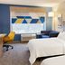 Holiday Inn Express & Suites Drums-Hazleton guest room with two beds and window seating in Drums