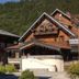 Chalet Hotel Régina in Les Gets with alpine chalet facade and mountain backdrop