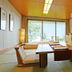 Atami Club Geihinkan in Atami suite with tatami seating and ocean-view balcony