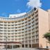 Toyoko Inn Narita Airport Honkan in Narita, curved mid-rise hotel exterior with many balcony-style windows