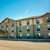 My Place Hotel - Rapid City, SD exterior with entrance and parking lot in Rapid City