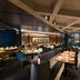 DoubleTree by Hilton Hotel Jakarta - Diponegoro dining room with tables, lounge seating and city views
