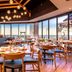 The Grand Hotel Golf Resort & Spa, Autograph Collection dining room with floor-to-ceiling ocean views in Point Clear