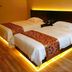 Shell House Hotel in Baoding twin room with two beds and warm under-bed lighting