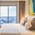 AZ Hotel Vague D'or Algiers guest room with sea view and balcony seating