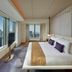 Mandarin Oriental, Tokyo guest room with city skyline views and large floor-to-ceiling windows