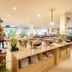 Lombok Garden Hotel in Mataram breakfast buffet with serving dishes and dining tables