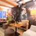 Lenzerhorn Spa & Wellness lounge in Vaz/Obervaz with mural wall, seating area and large windows
