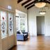 Elizabethan Lodge Blackburn lobby with stained-glass doors, exposed beams, and seating area