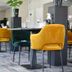 Fletcher Hotel Restaurant De Gelderse Poort in Ooij dining area with yellow chairs and set tables