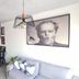 Apart Hotel Brisas do Amor in Pipa: modern suite with kitchen, dining table, sofa and wall art