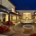 Royalton CHIC Punta Cana courtyard with lit pool and seating at night in Punta Cana