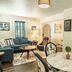 Eo Bungalows, Black Hills in Custer: cozy lounge with sofa, coffee table, armchair and round marble dining table