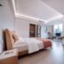 Huatian Century Hotel Liuzhou guest room with king bed, work desk and city view