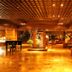 Gunma Royal Hotel in Maebashi lobby with warm lighting, marble floors and seating area