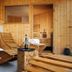 Michel Hotel Waldkirchen am Badepark in Waldkirchen spa area with wooden loungers and towels