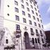 Hotel Monterey Nagasaki in Nagasaki, exterior facade with arched entrance and balconies