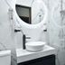 Imperial Palace Hotel, Yerevan: modern bathroom with round mirror, vessel sink and glass shower