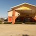 Super 8 by Wyndham Potosi exterior with covered entrance and parking lot in Potosi