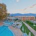 Litohoro Olympus Resort Villas & Spa in Kateríni with outdoor pool, mountain views and resort terrace