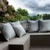 Meltar Boutique Hotel in Asiago lounge corner seating with mountain and forest view