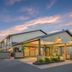 Best Western Black Hills Lodge in Spearfish exterior at dusk with covered entrance and parking lot