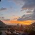 Bunk Stay Co-Working And Yoga in Rishikesh rooftop terrace with sunset mountain and river view