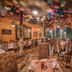 Hotel Posada del Hidalgo by Balderrama Hotel Collection in El Fuerte, colorful dining room with floral ceiling decor