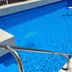 La Teresita Hotel Boutique in Salta, pool with bright blue water and stainless steel handrail