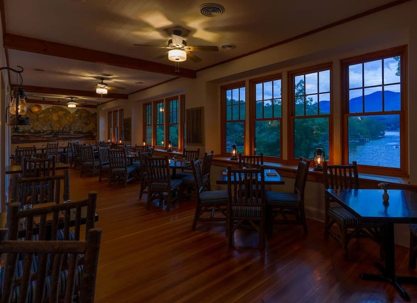 The Lodge on Lake Lure dining room with lake view windows in Lake Lure