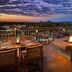 The Canyon Suites at The Phoenician, Scottsdale rooftop terrace with fire pit and desert sunset view