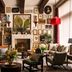 Graduate by Hilton Palo Alto lounge with gallery wall, fireplace, and red pendant lights