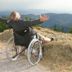 Guest in wheelchair enjoys mountain view at Gesundheitshotel Das Bad Peterstal, Bad Peterstal-Griesbach