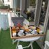 Erato Hotel in Agia Marina: breakfast tray on a balcony overlooking the pool