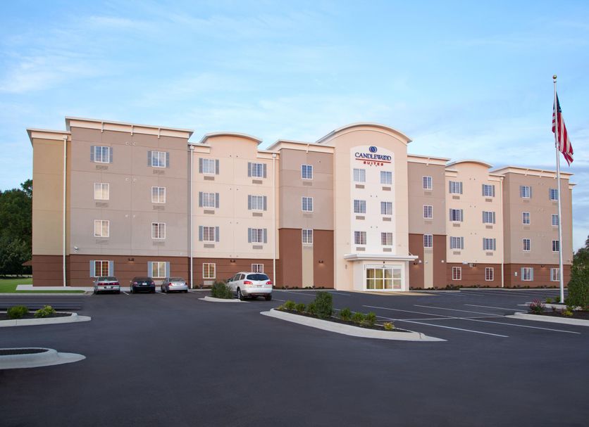 Candlewood Suites North Little Rock by IHG exterior with parking lot and American flag