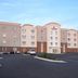 Candlewood Suites North Little Rock by IHG exterior with parking lot and American flag