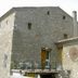 Albergue Rural Cal Picarol in Àger, stone hotel exterior with terrace and rustic rooftop