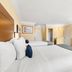 Travelodge by Wyndham San Clemente Beach guest room with two beds and TV